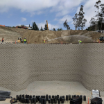 People constructing a stable retaining wall